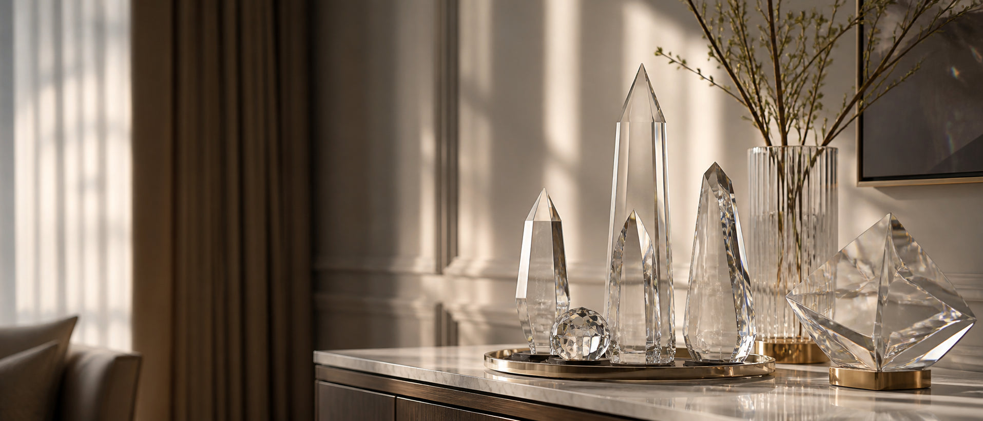 Crystal sculptures displayed in a sunlit interior